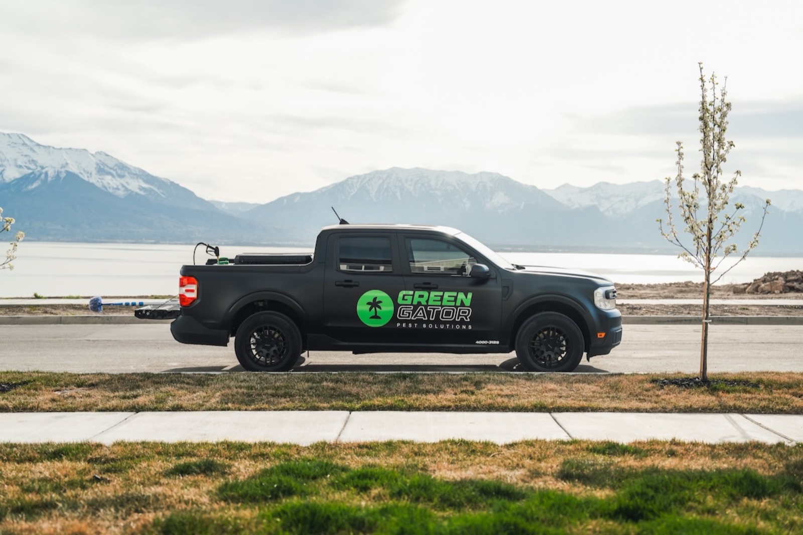 Green Gator pest control truck in Utah