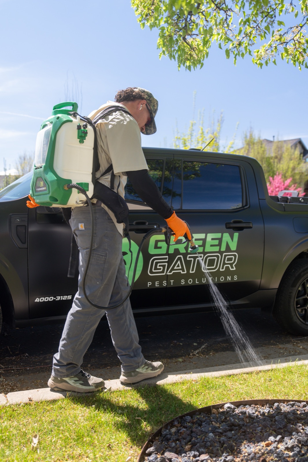 Green Gator flea control technician